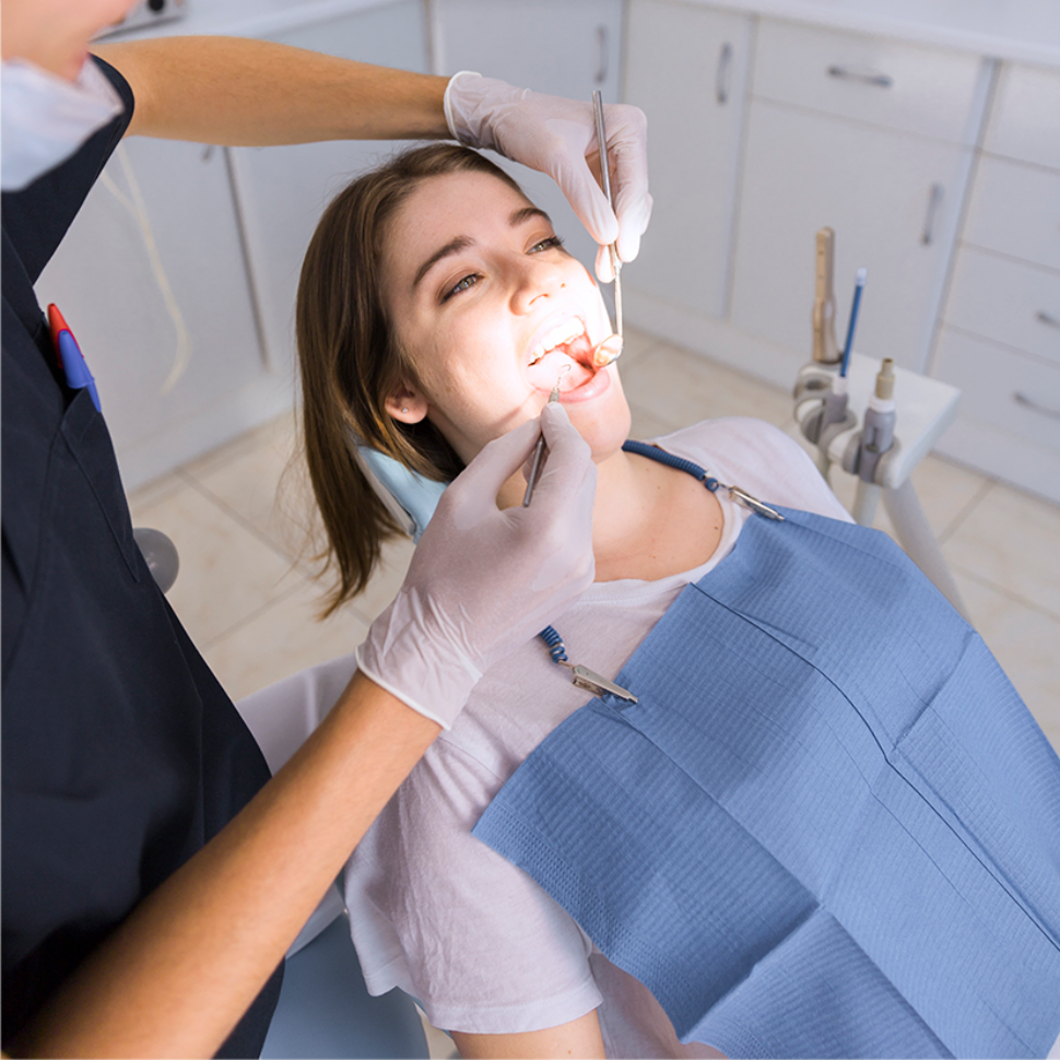 close-up-woman-getting-dental-check-up